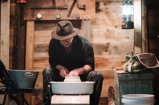 Mark creating pottery in the mill